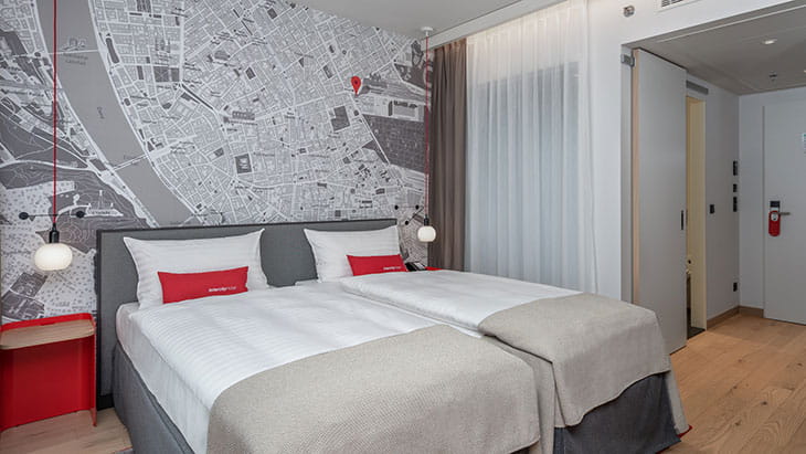 An IntercityHotel Budapest bedroom